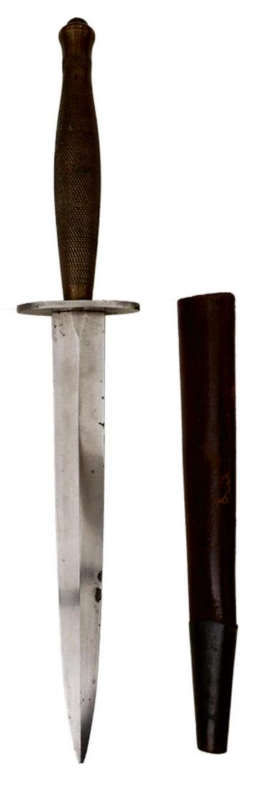 A FRENCH ISSUE SECOND PATTERN FS COMMANDO KNIFE OR DAGGER, 18.2cm flattened diamond section blade,: A FRENCH ISSUE SECOND PATTERN FS COMMANDO KNIFE OR DAGGER, 18.2cm flattened diamond section blade, tip chipped, regulation hilt, the crossguard marked LE VERITABLE MARQUE ET MODELE DEPOSES and INOX SP