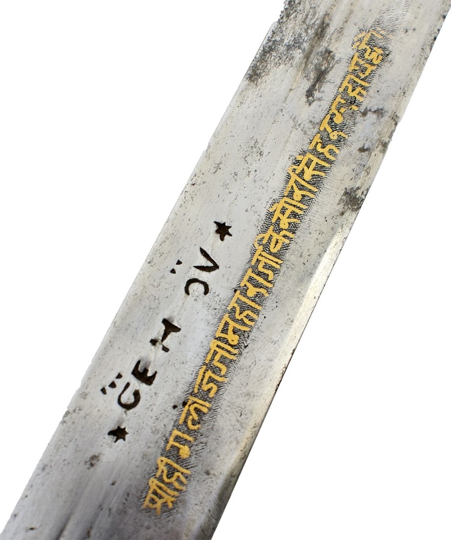 A 19TH CENTURY INDIAN KIRACH OR SWORD FOR A BOY,: A 19TH CENTURY INDIAN KIRACH OR SWORD FOR A BOY, 61.25cm double fullered blade, double edged towards the tip and struck with a series of maker's marks and a band of calligraphy in yellow metals, chara