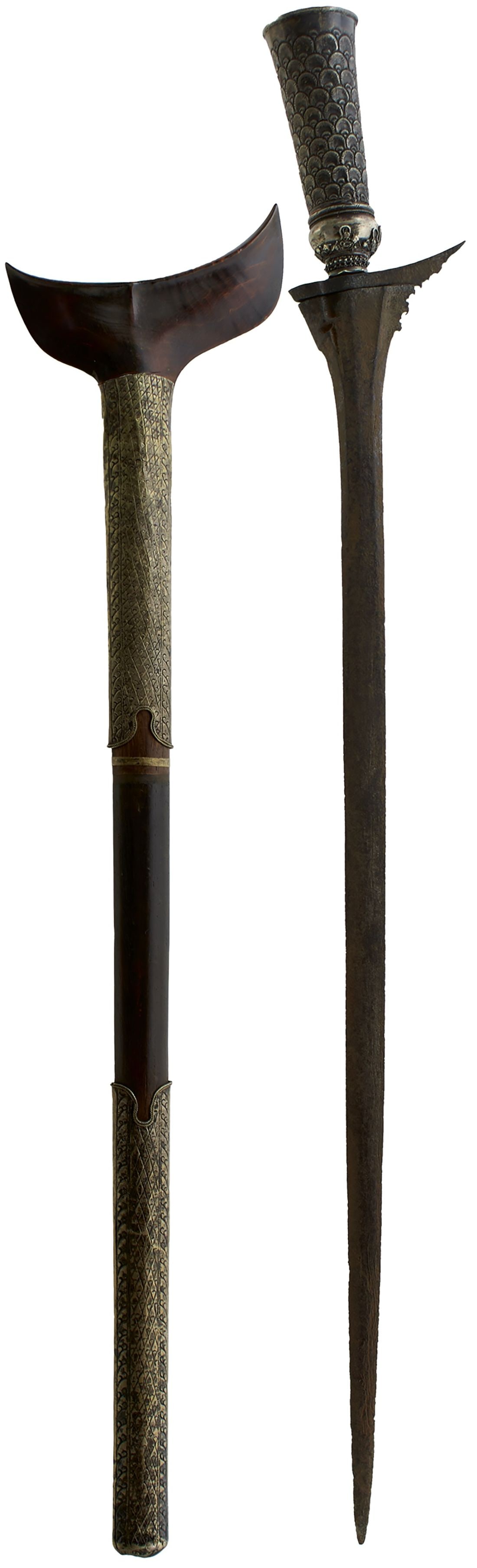 A GOOD 19TH CENTURY SULU EXECUTIONER'S KRIS,: A GOOD 19TH CENTURY SULU EXECUTIONER'S KRIS, 51.25cm straight, slender pamor blade with short winged top, characteristic tapering cylindrical white metal hilt with scale or petal decoration, two-stage