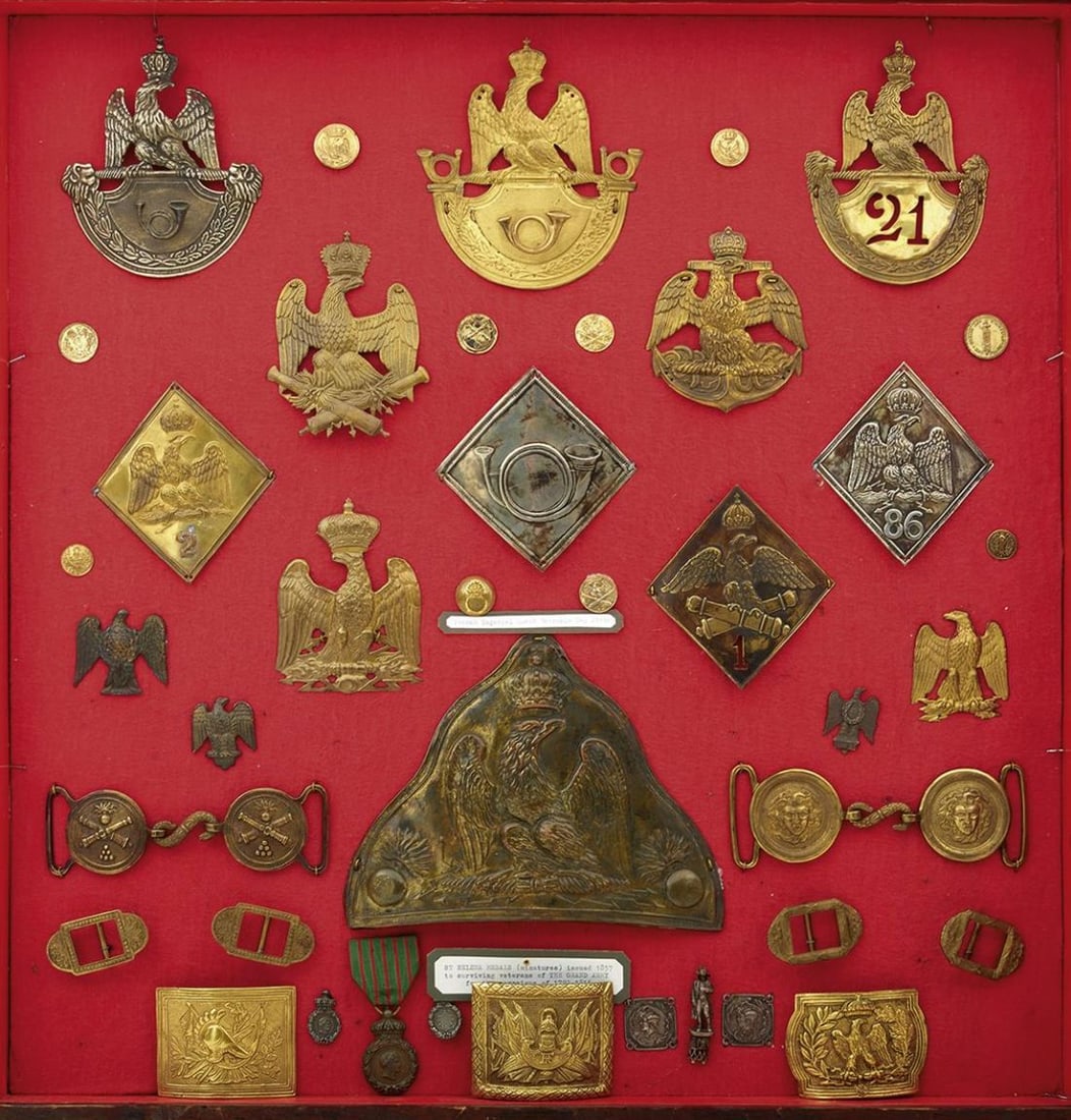 COPY IMPERIAL FRENCH SHAKO PLATES, FUR CAP PLATE, WAIST BELT PLATES AND CLASPS, BADGES AND BUTTONS.: COPY IMPERIAL FRENCH SHAKO PLATES, FUR CAP PLATE, WAIST BELT PLATES AND CLASPS, BADGES AND BUTTONS. framed display, all copies, fur cap plate to the Imperial Guard, four diamond pattern plates, and ma
