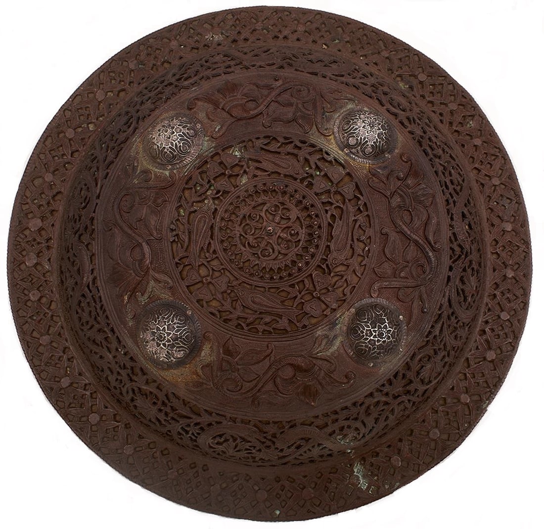 A FINE OTTOMAN DHAL OR SHIELD,: A FINE OTTOMAN DHAL OR SHIELD, 35.5cm diameter body overlaid with a finely pierced outer decorated with scrolling foliage, birds and geometric designs, four dome bosses of embossed silver decorated to