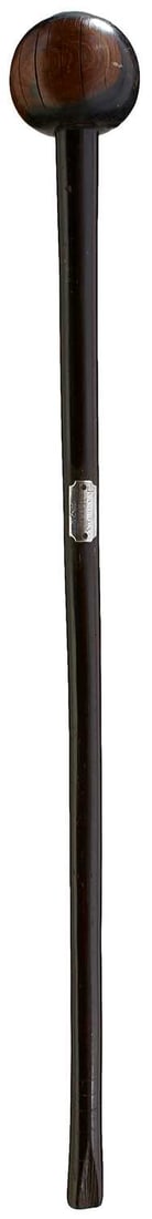 A GOOD 19TH CENTURY HEAVY ZULU KNOBKERRIE,: A GOOD 19TH CENTURY HEAVY ZULU KNOBKERRIE, c.1870, rich dark brown hardwood, the haft with white metal plaque engraved Kambula Hill 1879, 77cm long. Some age cracks on head and small chip in bottom of