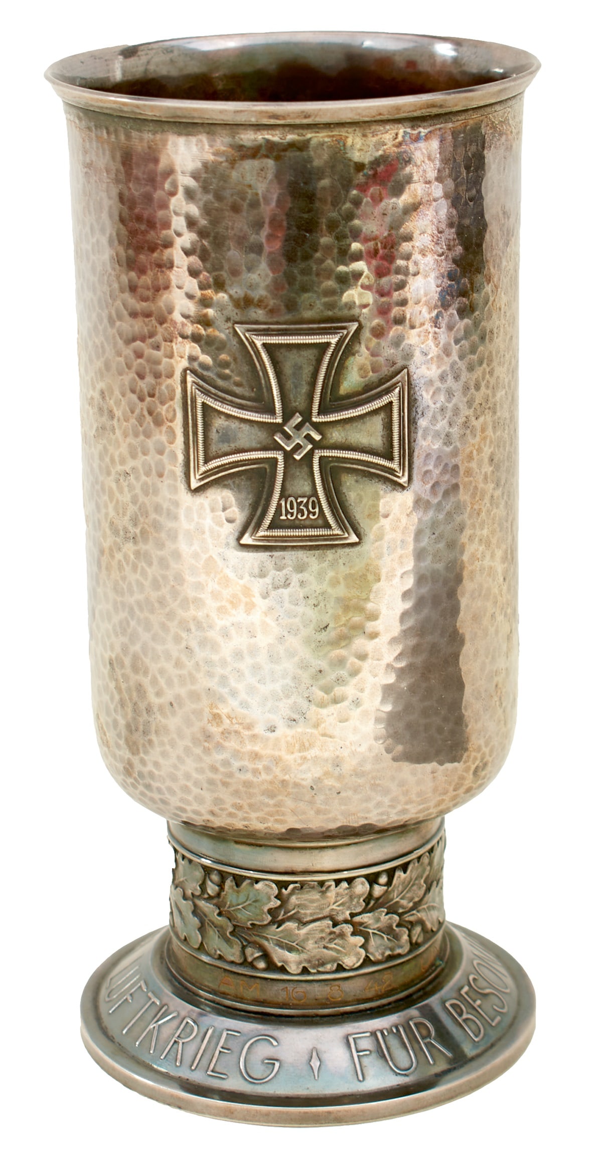 A GERMAN WORLD WAR II HONOUR GOBLET OR EHRENPOKAL,: A GERMAN WORLD WAR II HONOUR GOBLET OR EHRENPOKAL, awarded to UNTEROFFIZIER PETER HAHN 16th August 1942, of typical form and decorated with two fighting eagles opposing a cross dated 1939 on a spot ha