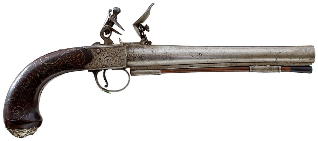 A 16-BORE FLINTLOCK BOXLOCK SILVER MOUNTED HOLSTER PISTOL BY WATERS,: A 16-BORE FLINTLOCK BOXLOCK SILVER MOUNTED HOLSTER PISTOL BY WATERS, 8.5inch swamped barrel, border and scroll engraved action signed WATERS, bag-shaped wooden grip finely inlaid with scrolling silver