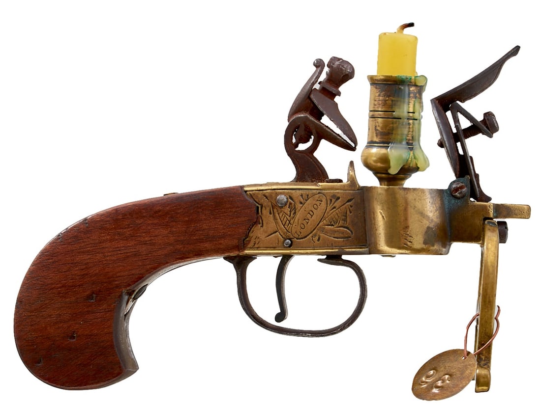 AN EARLY 19TH CENTURY FLINTLOCK TINDER LIGHTER BY R. ERBER OF LONDON,: AN EARLY 19TH CENTURY FLINTLOCK TINDER LIGHTER BY R. ERBER OF LONDON, plain fire pan, border engraved action decorated with stands of arms and signed R. ERBER, LONDON, candle holder mounted on the lef