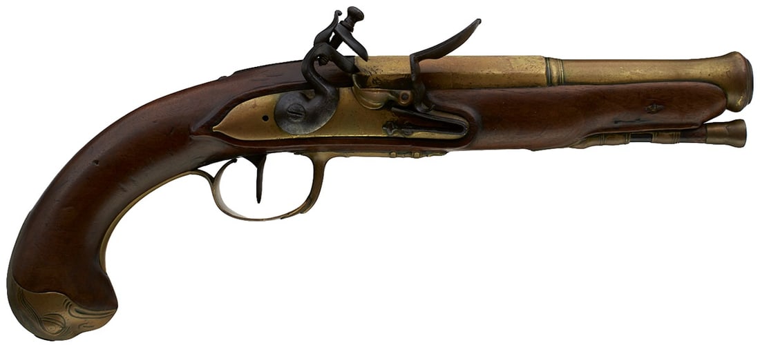 A 20-BORE FLINTLOCK CONTINENTAL CANNON BARRELLED TRAVELLING OR OFFICER'S PISTOL,: A 20-BORE FLINTLOCK CONTINENTAL CANNON BARRELLED TRAVELLING OR OFFICER'S PISTOL, 6.25inch two-stage brass barrel with ring turned muzzle, the left side of the breech stamped A*C, bevelled brass lock, 