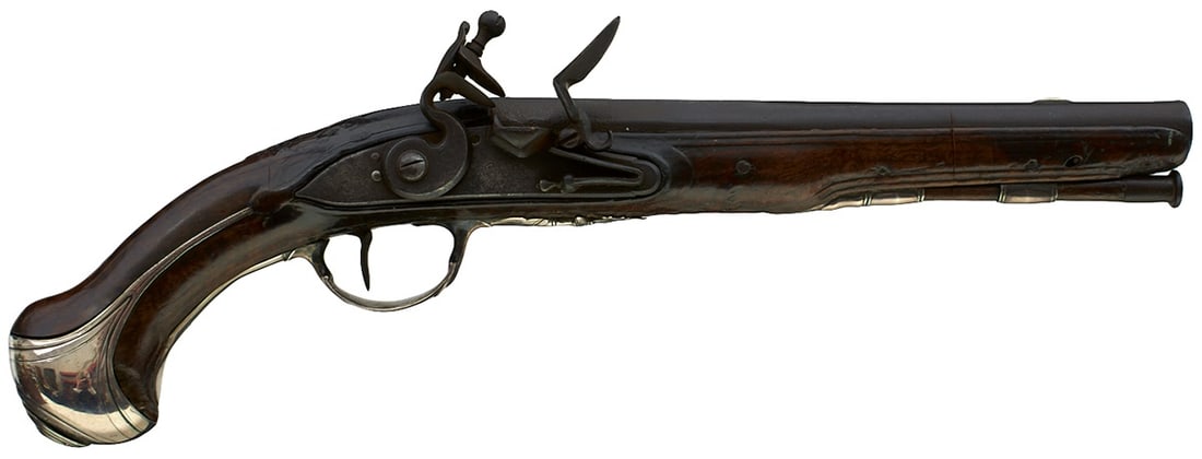A SCARCE PAIR OF .650 CALIBRE FRENCH FLINTLOCK SILVER MOUNTED NAVAL OFFICER'S PISTOLS,: A SCARCE PAIR OF .650 CALIBRE FRENCH FLINTLOCK SILVER MOUNTED NAVAL OFFICER'S PISTOLS, 8.5inch sighted barrels, border engraved locks decorated with scrolling foliage and signed P. Girard & Compagnie,