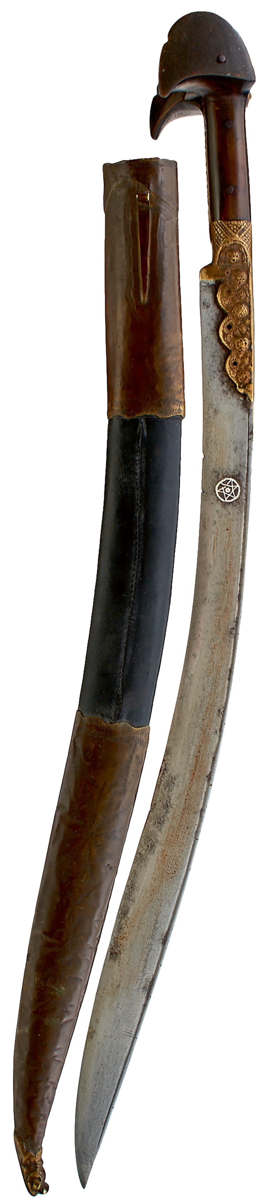 A 19TH CENTURY OTTOMAN TURKISH YATAGHAN,: A 19TH CENTURY OTTOMAN TURKISH YATAGHAN, 61cm sharply curved fullered blade decorated with a partial panel of script and a star form in silver, foliate embossed brass reinforce to the forte, character