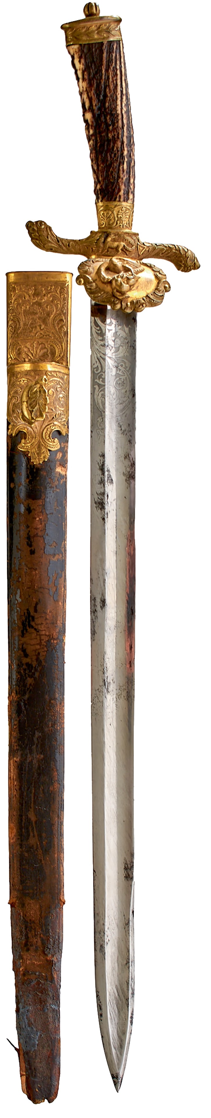 A HUNTING HANGER OF THE HOUSE OF SCHWARZENBERG,: A HUNTING HANGER OF THE HOUSE OF SCHWARZENBERG, 45.75cm fullered blade decorated with a small panel of scrolling foliage to either side of the forte and with partial maker's stamp for JUNG, characteri
