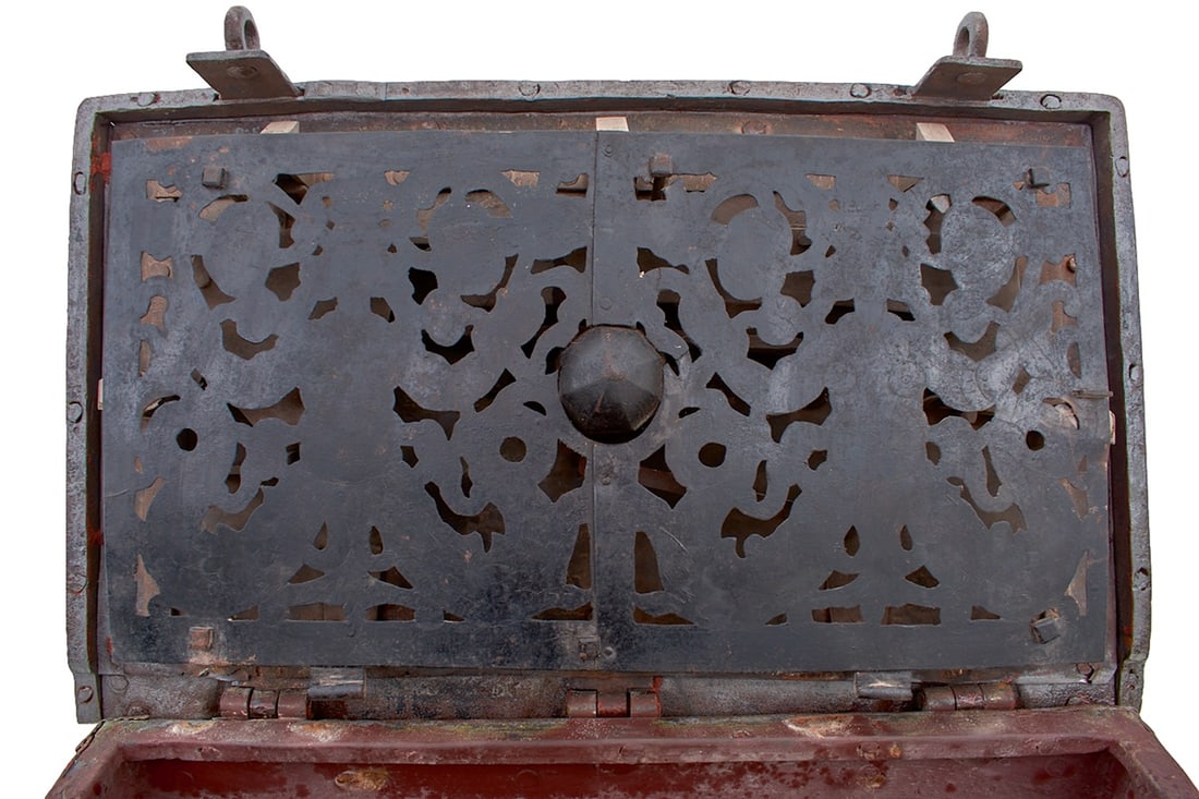 AN EARLY 17TH CENTURY GERMAN STRONG BOX OR SO CALLED "ARMADA" CHEST,: AN EARLY 17TH CENTURY GERMAN STRONG BOX OR SO CALLED "ARMADA" CHEST, or characteristic iron bound form with two wrought iron carrying handles to either end, false keyhole to the front with large pierc