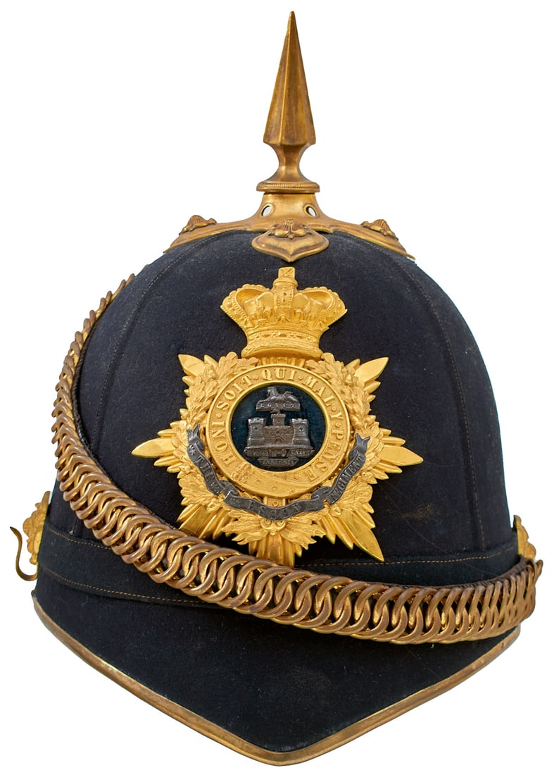 AN OFFICER'S BLUE CLOTH HELMET OF THE ESSEX REGIMENT,: AN OFFICER'S BLUE CLOTH HELMET OF THE ESSEX REGIMENT, the blue cloth body with gilt and brass mounts, to include gilt crowned rayed star helmet plate with central laurel wreath motto garter, centred w