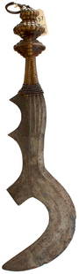 A CONGOLESE NGALA EXECUTIONER'S SWORD OR KNIFE,: A CONGOLESE NGALA EXECUTIONER'S SWORD OR KNIFE, 40cm multi-fullered F-shaped crescent blade, characteristic stepped wooden hilt set with brass studs and iron and brass bindings, old lot 1457, Wallis W