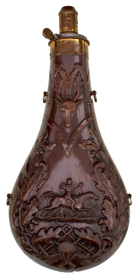 A GOOD LARGE SIZED DIXON POWDER FLASK,: A GOOD LARGE SIZED DIXON POWDER FLASK, the copper body embossed to the front and decorated with oak leaves, hunting scenes, a fox and a stag, retaining virtually all of its original lacquer, brass top