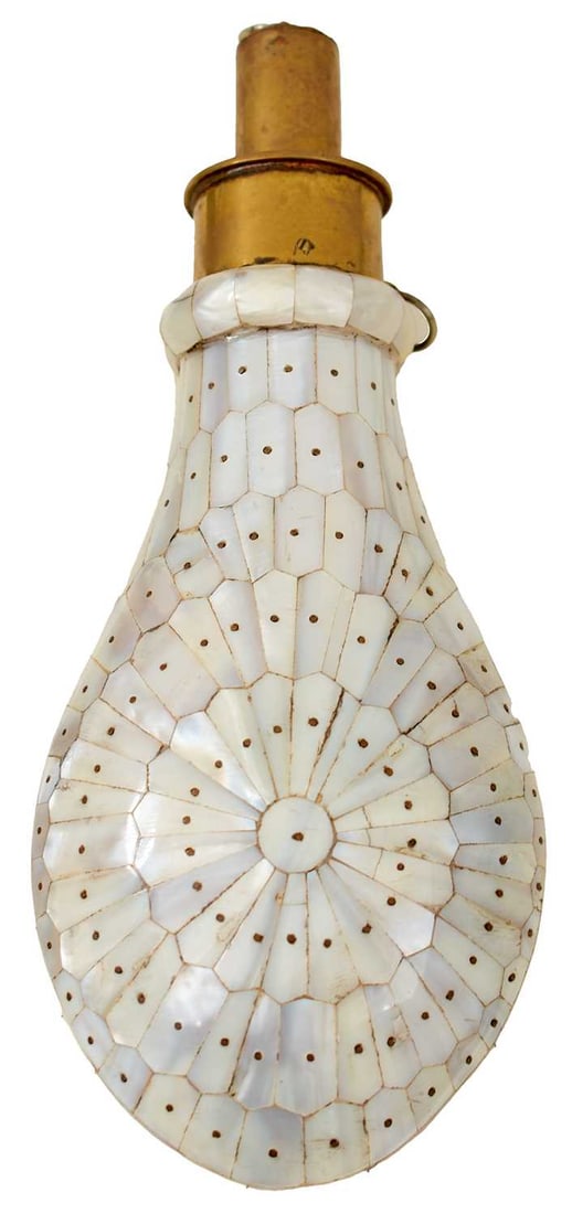 A MODERN INDIAN OR MIDDLE EASTERN MOTHER-O'-PEARL POWDER FLASK,: A MODERN INDIAN OR MIDDLE EASTERN MOTHER-O'-PEARL POWDER FLASK, the pear-shaped body decorated over all with geometric panels, turned brass top with chained measure, together with a North African bras