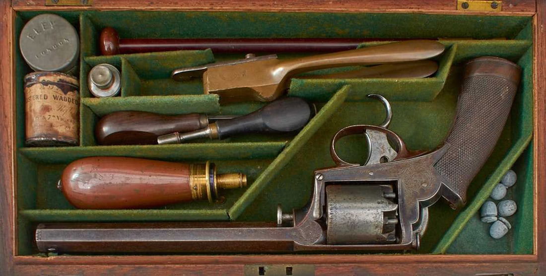 A SCARCE CASED 38-BORE FIVE-SHOT PERCUSSION DOUBLE TRIGGER TRANTER ADAMS PERCUSSION DRAGOON: 8inch sighted octagonal barrel engraved W. SQUIRES, 315A OXFORD ST. LONDON, border and scallop engraved cylinder, border and scroll engraved frame, engraved ADAMS PATENT No. 12494R to the right side,