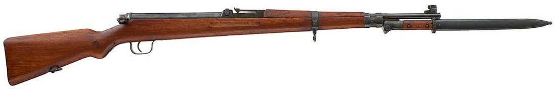 A CZECH VZ35 TRAINING AIR RIFLE,: 21.25inch sighted barrel fitted with rear ramp sights and stamped with the Model and maker details, full military stock with regulation steel mounts, complete with bayonet and scabbard. Dated 1937.