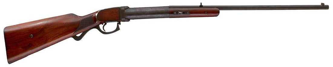 A BUGEL SPANNER AIR RIFLE,: 20.5inch sighted octagonal blued barrel fitted with a rear notch sight, the cylinder marked TORO, the stock stamped NE 10 to the left side.