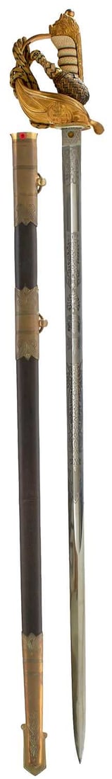 A ROYAL NAVAL OFFICER'S SWORD,: 79.5cm fullered clean blade etched with scrolling oak leaves and acorns within a roped border, crowned fouled anchor, crowned Royal arms, regulation gilt brass gothic hilt incorporating a KC crowned