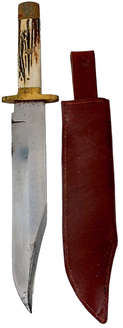 A LARGE MODERN BOWIE KNIFE BY NOWILL & SONS,: 26.5cm clipped back blade etched with the manufacturer?s details, brass mounted hilt with two-piece riveted stag?s horn grips, in its leather sheath.