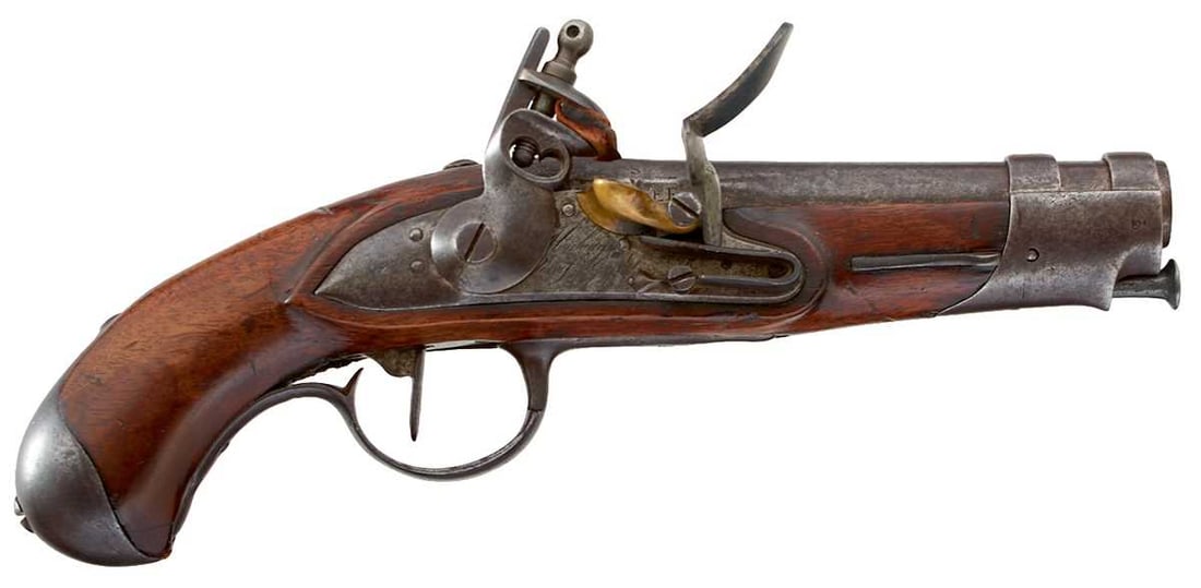 A .600 CALIBRE FRENCH FLINTOCK GENDARMERIE SERVICE PISTOL,: 5inch barrel, stepped and bevelled lock engraved Mauberge Manuf. Imple, brass pan, full stocked with various stamps and regulation steel mounts.