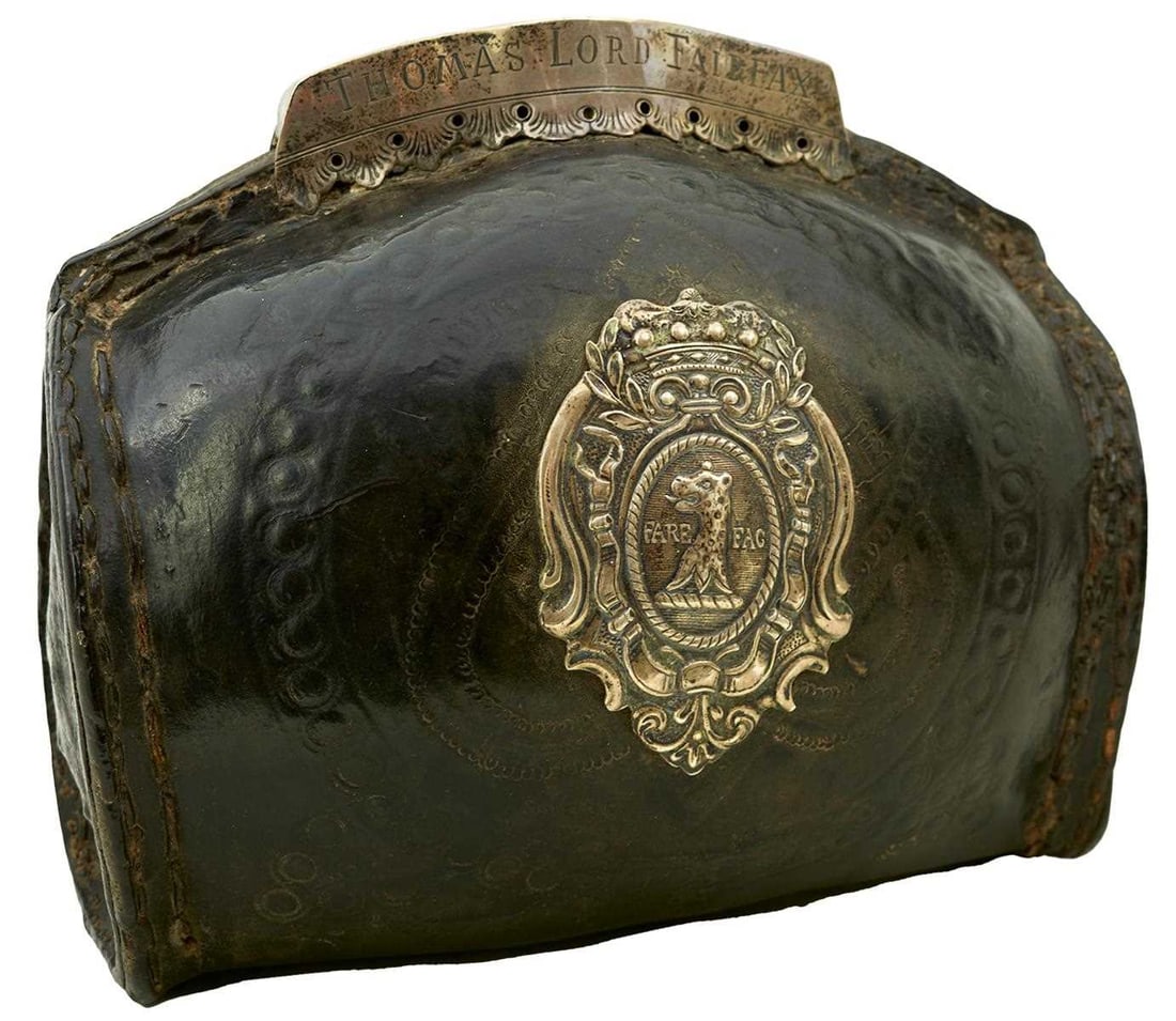 A 17TH CENTURY ENGLISH CIVIL WAR RELATED SILVER MOUNTED LEATHER COVERED FLASK BELONGING TO SIR: unhallmarked, the silver rim inscribed THOMAS LORD FAIRFAX to the front, and 1646 flanked by flower heads to the reverse, stitched seams flank the leather front face embossed with circles and
