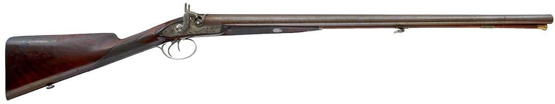 A DOUBLE BARRELLED 12-BORE PERCUSSION SPORTING GUN BY CHARLES MOORE,: 29inch sighted browned damascus barrels engraved C. Moore REGENT CIRCUS Piccadilly, platinum breeches with browned fences overlaying the barrels, border and scroll engraved barrel tang, border and scr