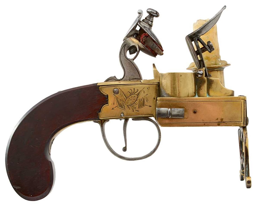 A GOOD LARGE FLINTLOCK TINDER LIGHTER NAMED TO THE GEORGE HOTEL IN STAMFORD,: border engraved boxlock action decorated with stands of arms, tinder box with sliding catch, candle holder, pierced scrollwork legs, engraved The George, Stamford, No.3 to the underside.