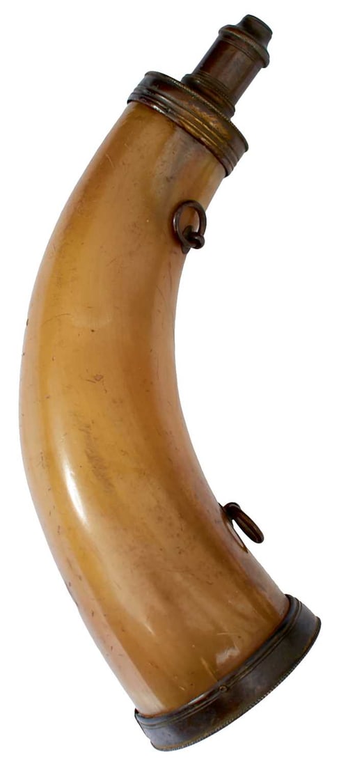 A POWDER HORN,: 8.5 in long, brass base cover with concentric rings, two carrying loops in body, brass tip with fixed spout, believed to be French.