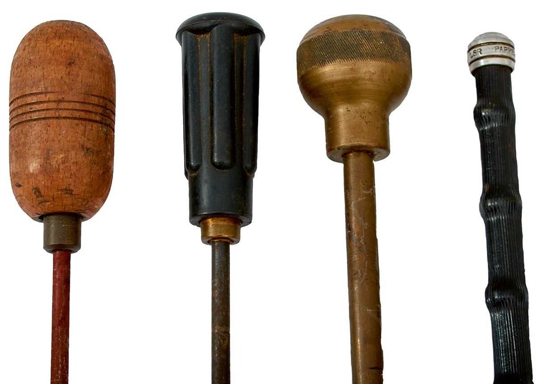 A SELECTION OF RAMRODS AND A FENCING FOIL,: comprising five loading or cleaning rods, a bore cleaning tube, a fencing foil and a strip of wood. (8)