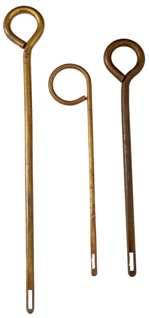 THREE EARLY PISTOL CLEANING RODS,: the longest 24.5cm long.