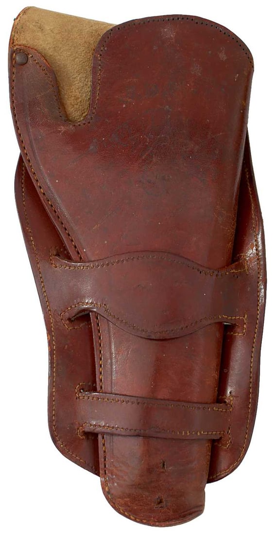 A BROWN LEATHER HOLSTER FOR A COLT REVOLVER,: c.1900, of typical Wild West design, with soft leather liner, together with a more modern Colt Revolver holster, probably for a Peacemaker. (2)