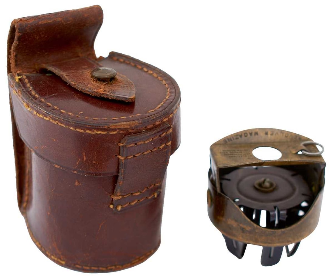 A RARE FIRST WORLD WAR PRIDEAUX'S PATENT .455 WEBLEY REVOLVER FAST LOADER,: in its leather storage case with belt loop.