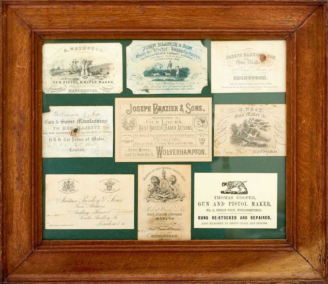 A FRAMED COLLECTION OF NINE GUN MAKER'S TRADE LABELS,: to include Watmough, Wilkinson & Son, Purdey n& Sons, Blanch & Son, Brazier & Sons, Wheeler & Son, Harkom & Son, West and Thomas Cooper.