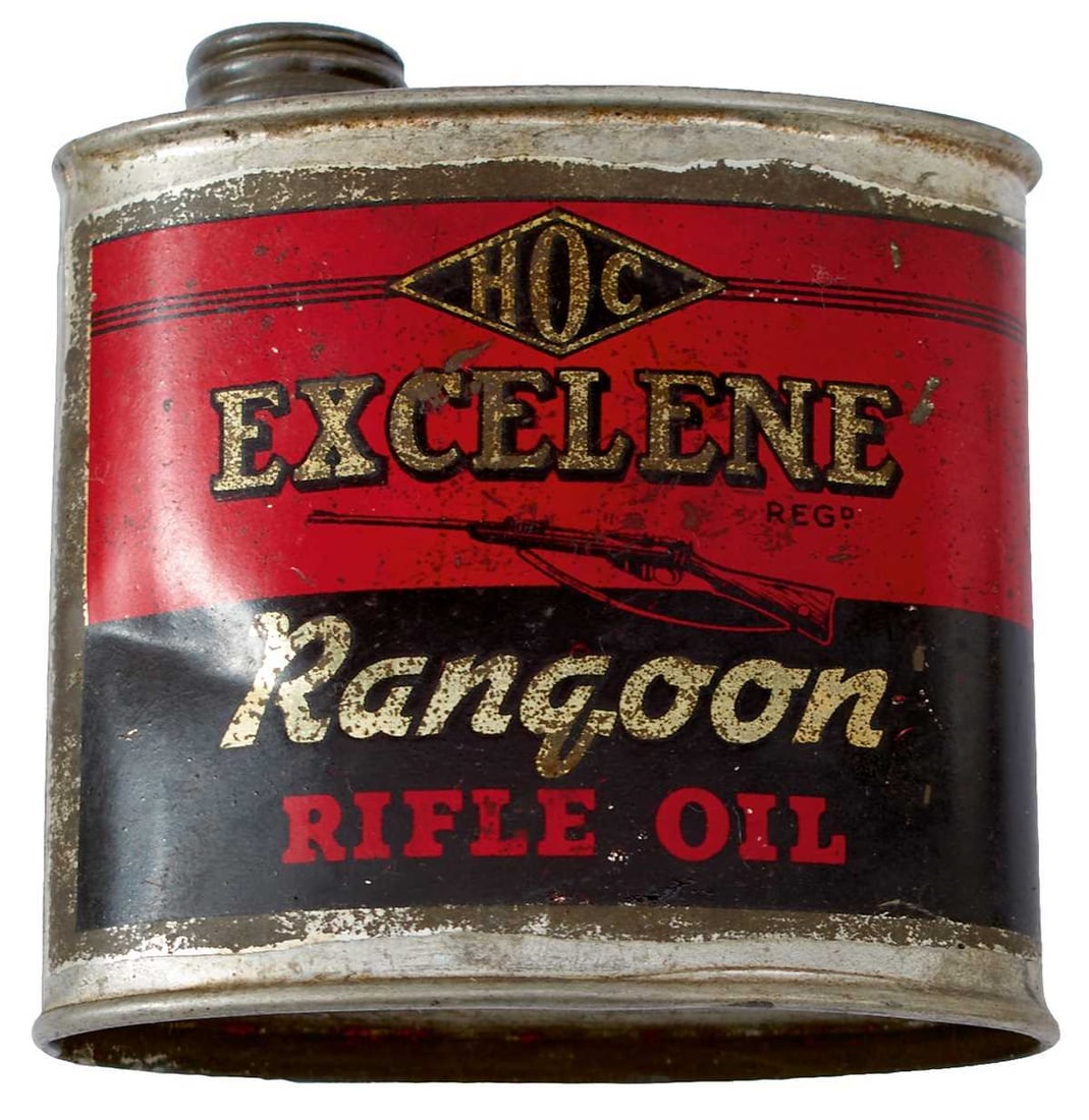 A MIXED BOX OF SHOOTING ACCESSORIES,: to include, license holder, snap caps, pull through, trigger lock, butt plate, oil bottle, spirit flask etc. (Parcel)