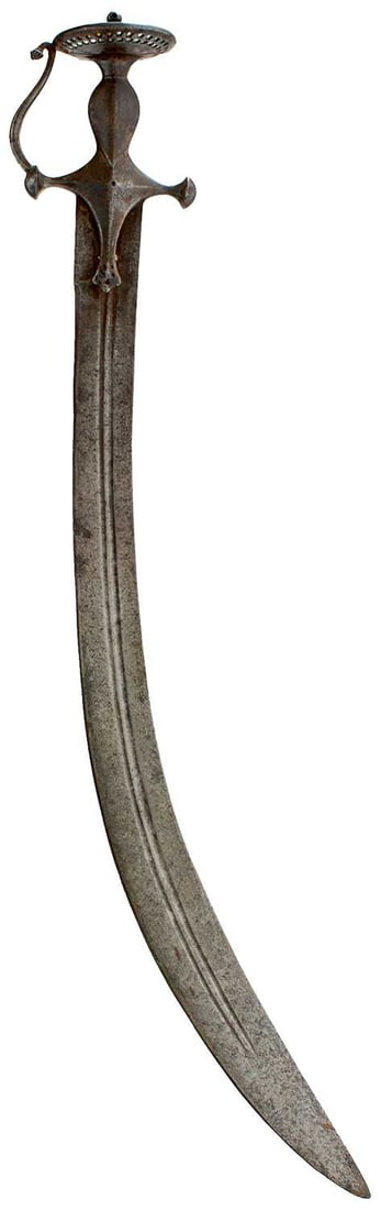 A LATE 18TH OR EARLY 19TH CENTURY INDIAN TULWAR,: 71.5cm sharply curved broad fullered blade, struck with an Arsenal or maker's mark to the right side of the forte, characteristic hilt with pierced and shaped elongated langets, domed quillons, the