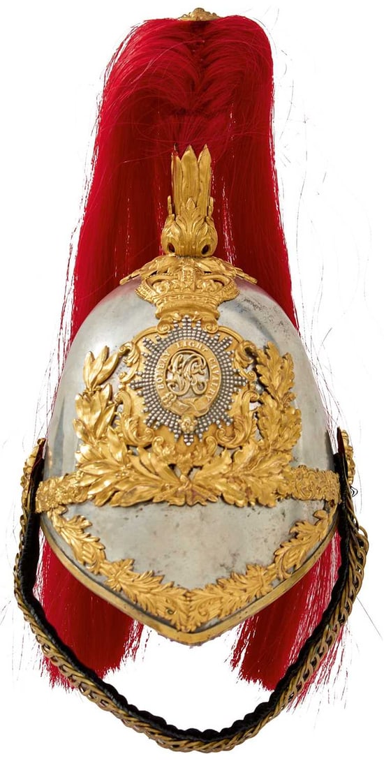 A SCARCE BOMBAY LIGHT CAVALRY OFFICER'S 1847 PATTERN HELMET,: the steel skull with gilt mounts, laurel and acanthus trim and head band, crowned laurel wreath helmet plate with central faceted rayed star, regimental title in garter surround with pierced VR cypher