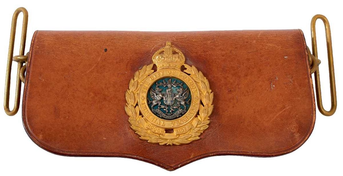 THE CITY OF LONDON IMPERIAL YEOMANRY (ROUGH RIDERS) UNDRESS SHOULDER BELT POUCH,: the brown leather body applied to the flap with a gilt regimental device, crowned laurel wreath with central regimental title in garter surround, central white metal City of London crest, brass suspen