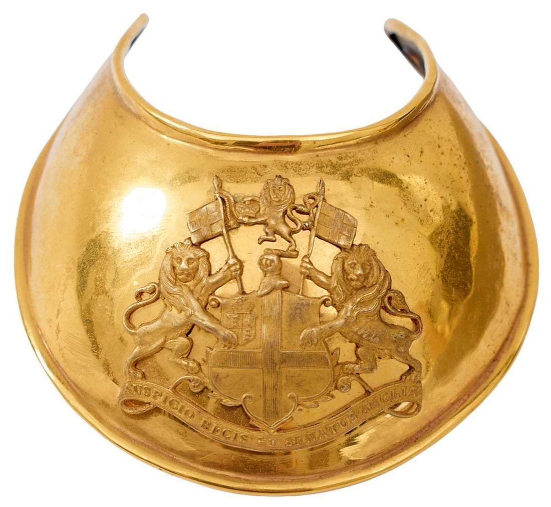 A GEORGIAN HONOURABLE EAST INDIA COMPANY OFFICER'S GORGET: the gilt body with turned rim and pierced arms, applied with the pierced gilt crest of the East India Company surmounting the motto AUSPICIO REGIS ET SENATUS ANGLIAE in scroll banner form.