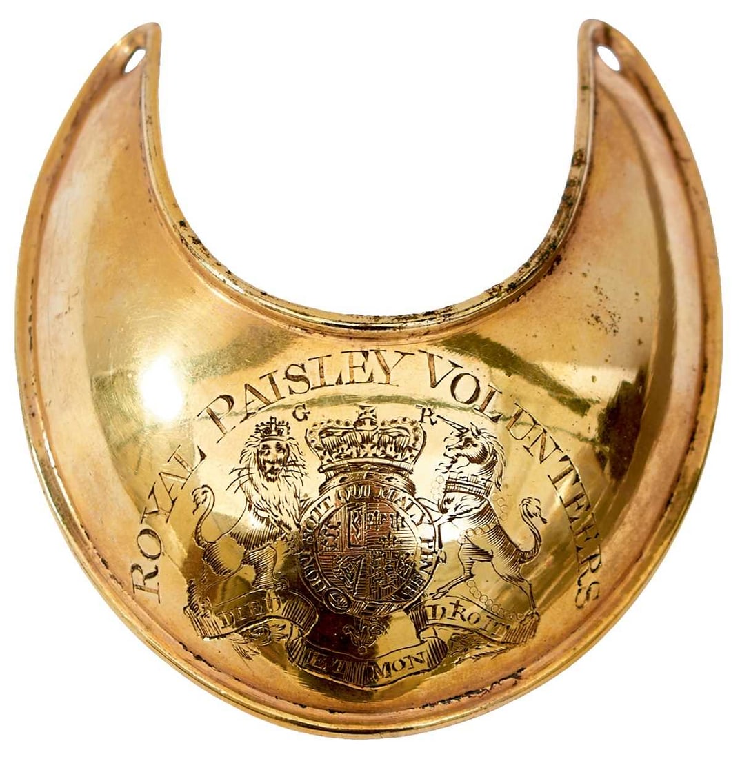 A SCOTTISH GEORGIAN OFFICER'S GILT GORGET OF THE ROYAL PAISLEY VOLUNTEERS,: the copper gilt body decorated with the Royal arms and the motto DIEU ET MON DROIT, below ROYAL PAISLEY VOLUNTEERS, pierced for a neck tie.