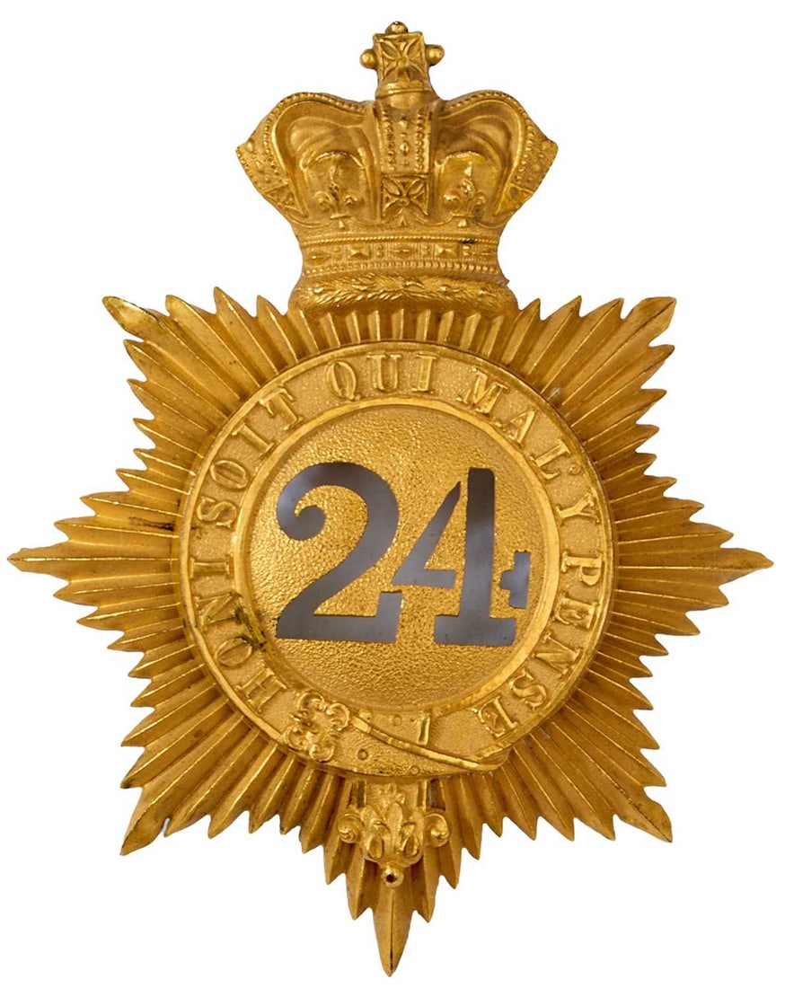 A 24TH REGIMENT OF FOOT SHAKO PLATE OR BADGE,: the gilt small sized crowned rayed star with central polished gilt garter HONI SOIT QUI MAL Y PENSE, pierced 24 on a stippled gilt ground.