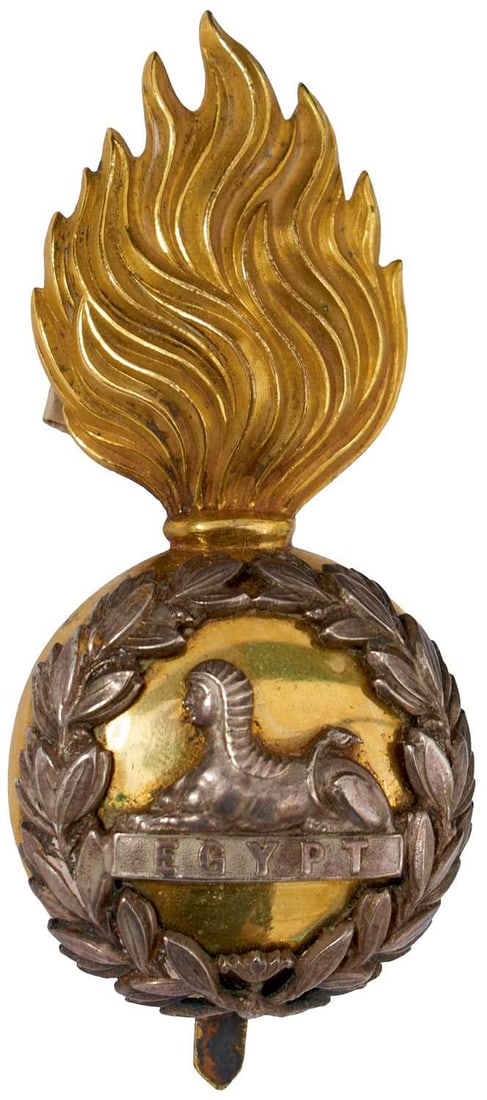 A LANCASHIRE FUSILIERS OFFICER'S FUR CAP BADGE,: the gilt flaming grenade with white metal laurel wreath and sphinx and EGYPT battle honour centered.