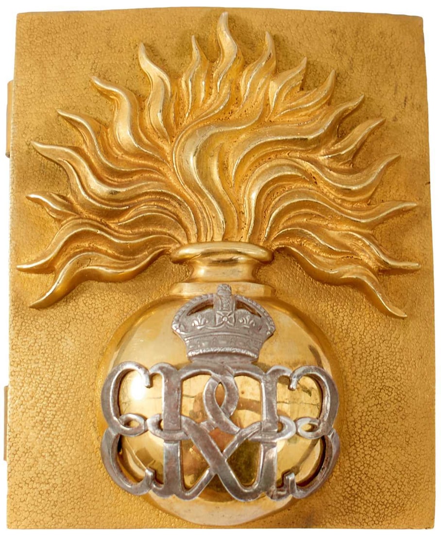 AN EDWARD VIII GRENADIER GUARDS OFFICER'S SHOULDER BELT PLATE,: the stippled gilt rectangular plate with flaming grenade applied with a white metal crown over Royal cypher.