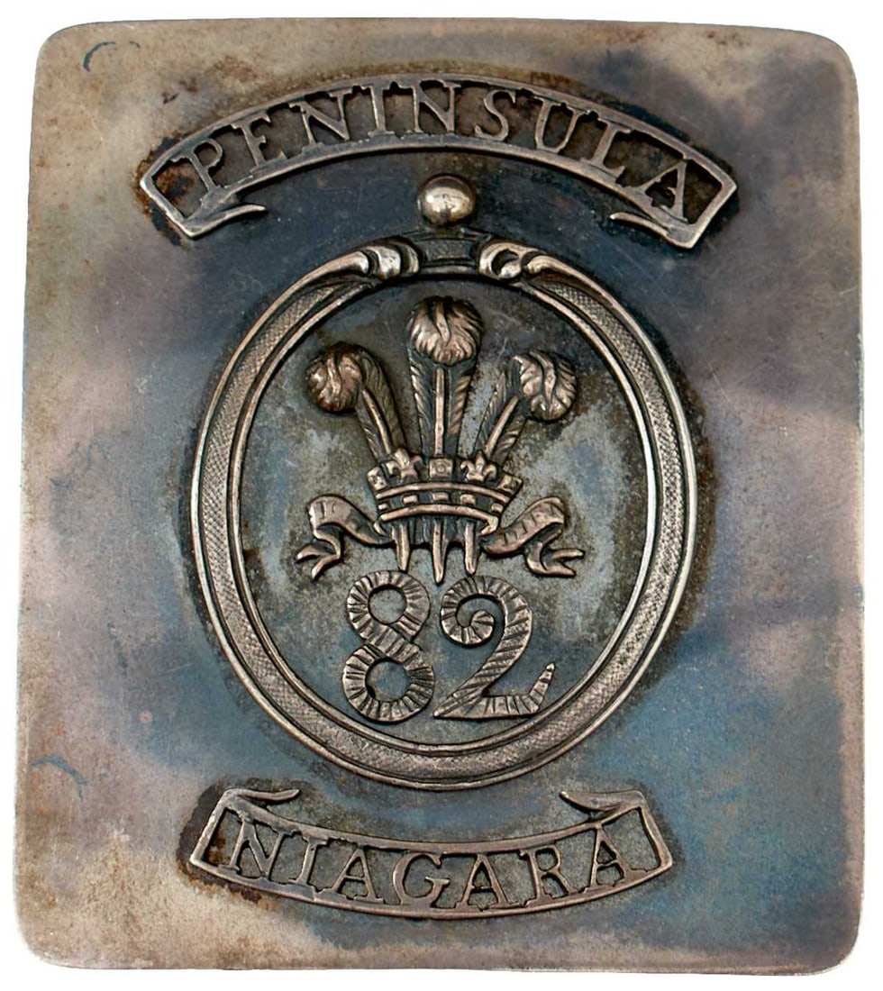 A GEORGE IV 82ND (PRINCE OF WALES VOLUNTEERS) REGIMENT OFFICER'S SHOULDER BELT PLATE,: white metal rectangular plate, centred 82 beneath the Prince of Wales feathers within an oval, PENINSULA and NIAGARA above and below.
