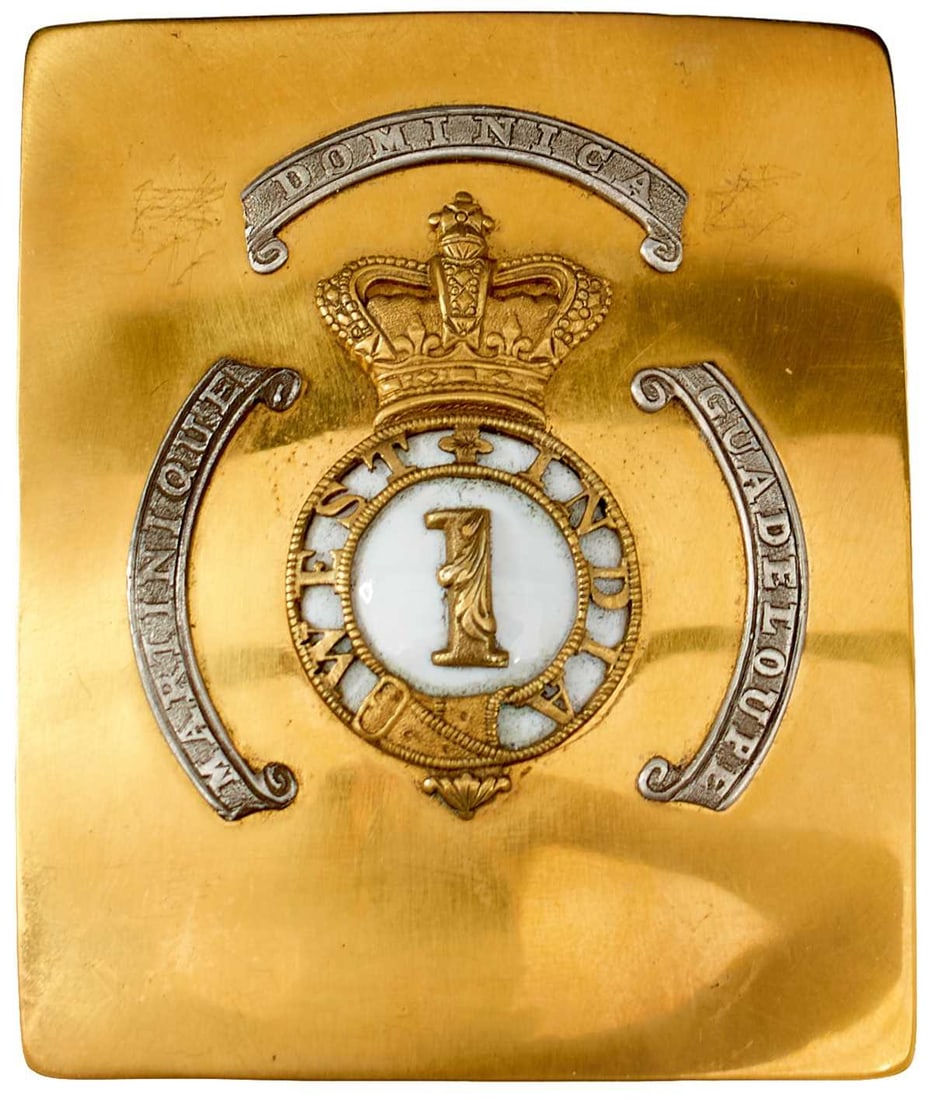 A GEORGE IV 1ST (WEST INDIAN) REGIMENT OFFICER'S SHOULDER BELT PLATE,: gilt rectangular plate with crown surmounting 1 and WEST INDIA on a white enamel ground, surrounded by three white metal scrolls with battle honours MARTINIQUE, DOMINICA and GUADELOUPE, leather liner.