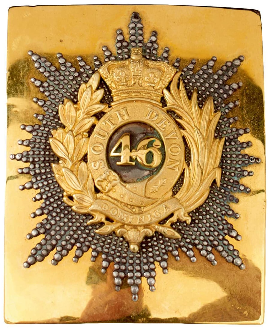 A 46TH (SOUTH DEVON) REGIMENT OFFICER'S SHOULDER BELT PLATE,: gilt rectangular plate applied with a white metal rayed star, gilt metal 46 centred, surrounded by SOUTH DEVON on a crowned strap, surrounded by a laurel and palm leaf spray, DOMINICA below.