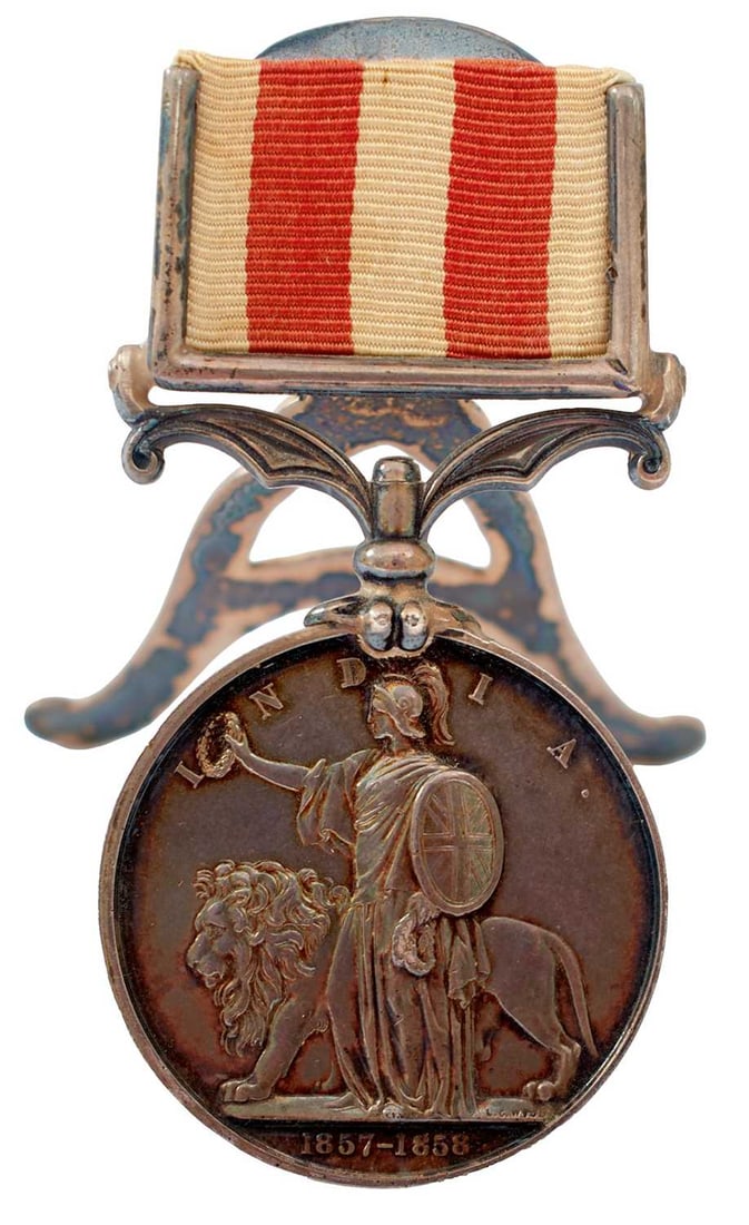 INDIAN MUTINY MEDAL 1857-1859,: to GEO CUNNOLD. 82ND REGT. (Prince of Wales' Volunteers, now mounted with a hallmarked silver menu stand Birmingham 1906.