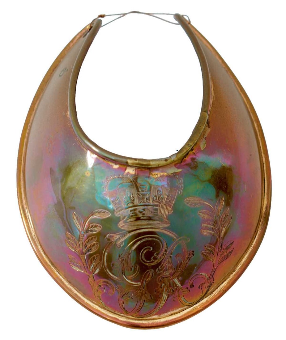 A GEORGIAN OFFICER'S UNIVERAL PATTERN GORGET,: the copper body with turned rim and pierced arms, engraved to the front with a crowned GR cypher. Soldered repair to rim.
