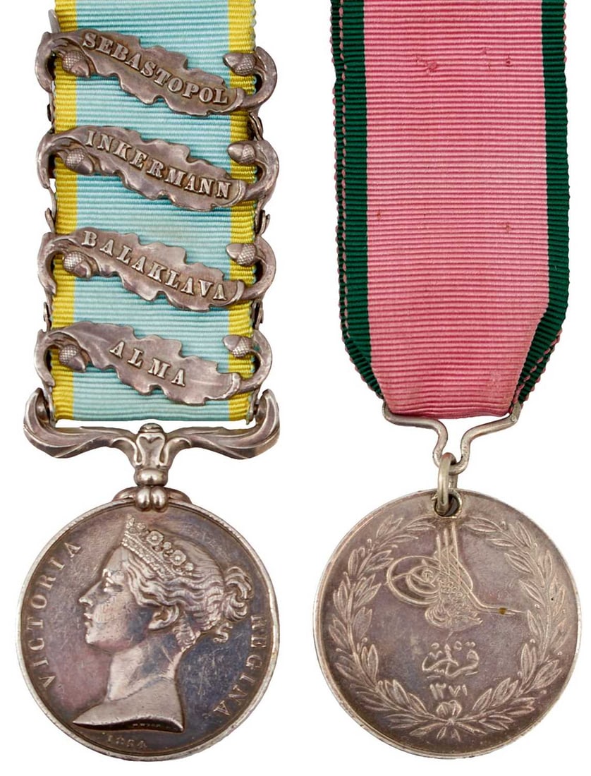 A CRIMEAN WAR MEDAL GROUP TO EDWARD DUKE ROYAL HORSE ARTILLERY,: marked to XXXARD DUKE J. TROOP RHS, bars for SEBASTOPOL, INKERMANN, BALAKLAVA and ALMA, together with its companion Turkish Crimea Medal named to E. DUKE I.T. R.H.A. Edge knocks to the first.