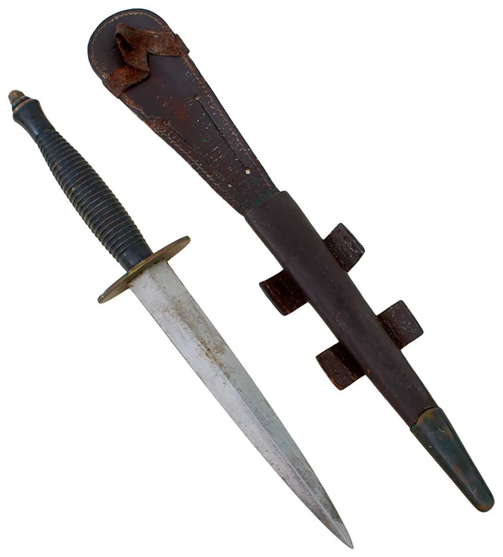 A THIRD PATTERN COMMANDO DAGGER,: 17.5cm flattened diamond section blade etched with a maker's panel for J. NOWILL, regulation alloy hilt with large brass guard and blacked ribbed grip, in its blackened brass mounted leather sheath,