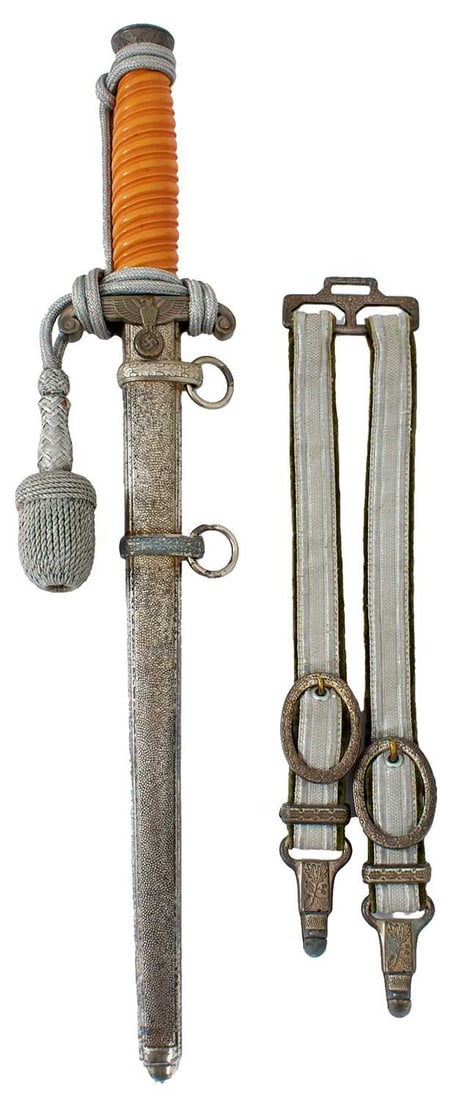 A THIRD REICH ARMY OFFICER'S DAGGER,: 25.5cm flattened diamond section blade by Horster of Solingen, regulation alloy hilt with spirally fluted orange celluloid grip, in its plated stippled steel scabbard, complete with knot and straps.